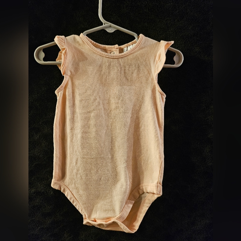 Pink ruffle sleeve onesie